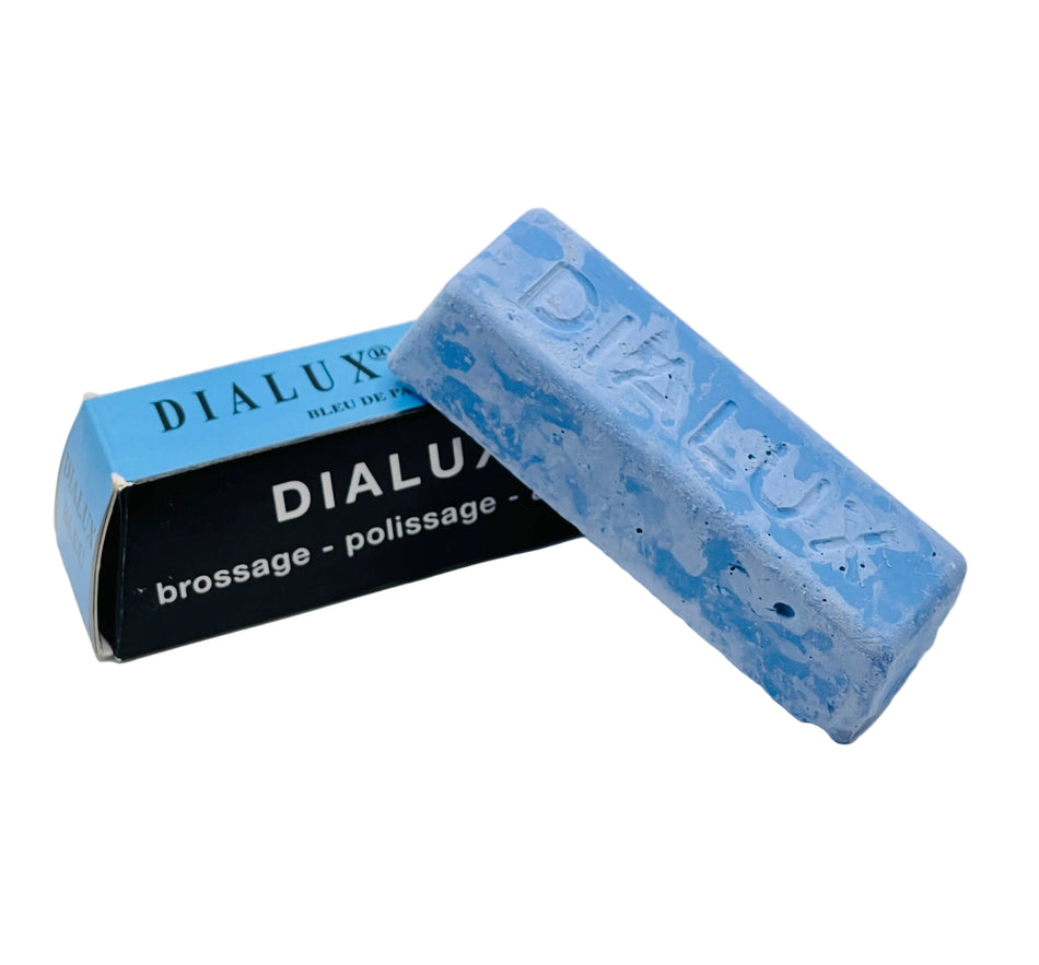 Blue Dialux bar of soap with packaging on a white background