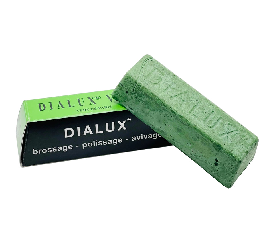 Green Dialux bar of soap with packaging on a white background