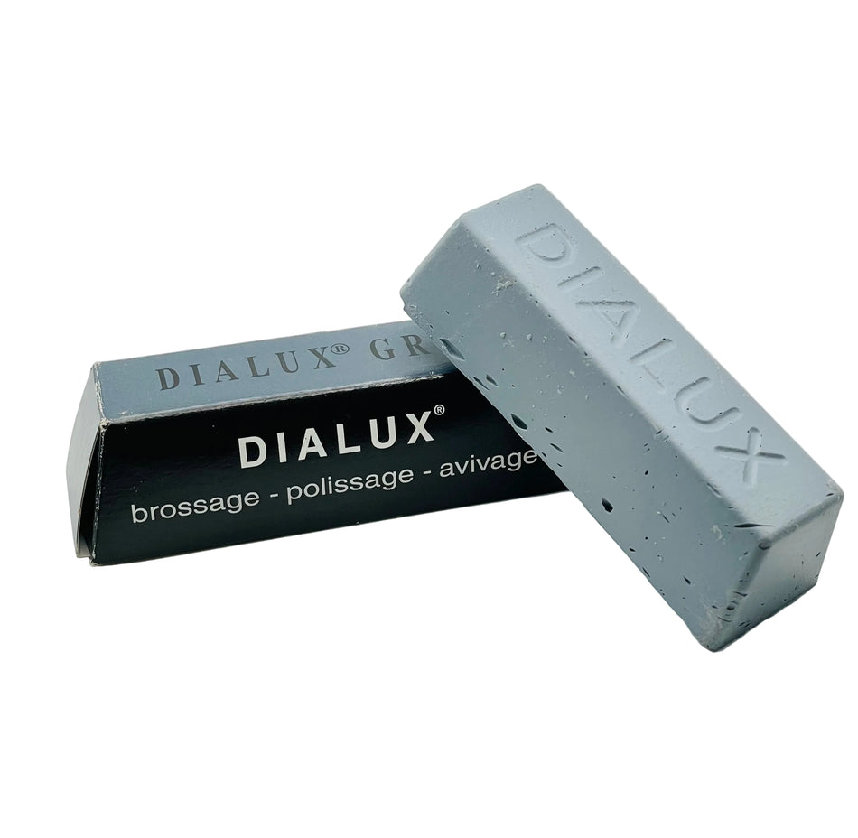 Gray Dialux polisher with packaging on a white background